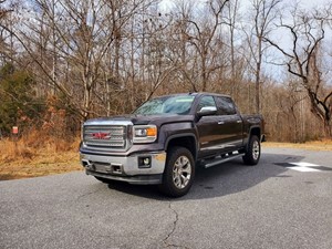 Picture of a 2015 GMC Sierra 1500 SLT Crew Cab Long Box 4WD