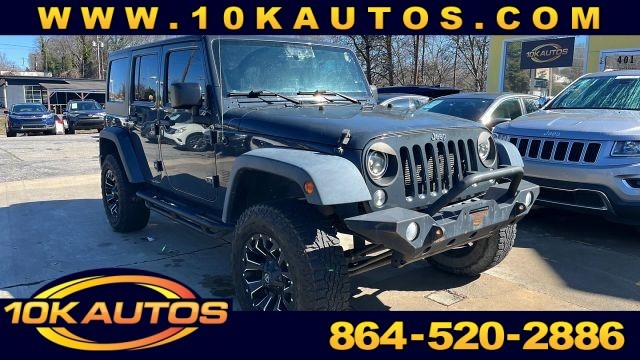 Picture of a used 2016 Jeep Wrangler Unlimited Sport SUV 4D