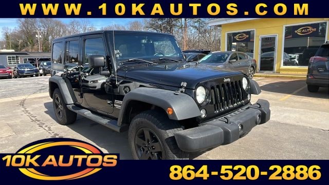 Picture of a used 2014 Jeep Wrangler Unlimited Sport S SUV 4D