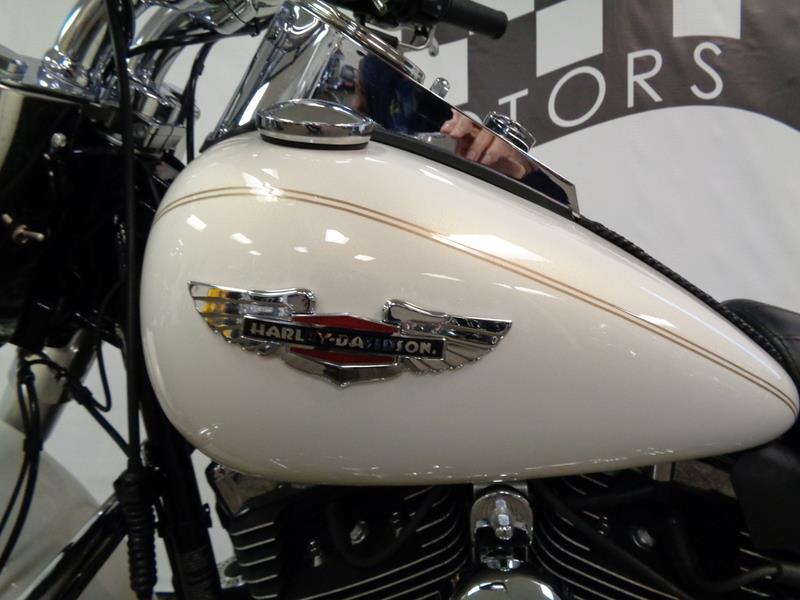 The 2014 Harley-Davidson FLSTN - Softail® Deluxe 